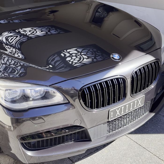 BMW 7 Series bonnet with mirror reflections