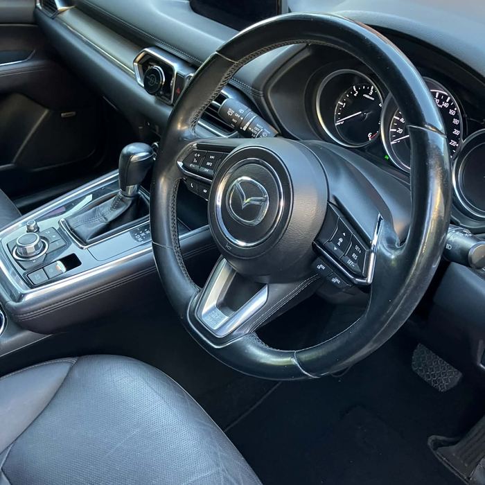 Mazda CX-8 steering wheel and console