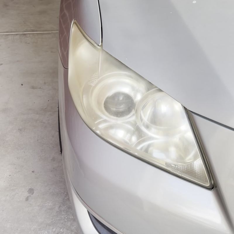 Cloudy, yellowed headlight before restoration