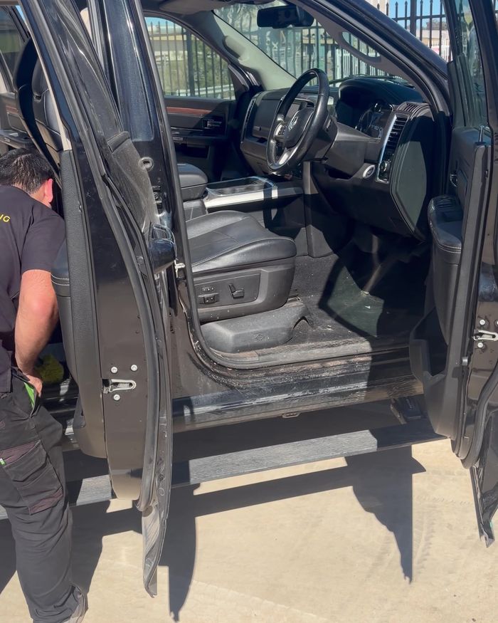 Cleaning the interior of a dark ute