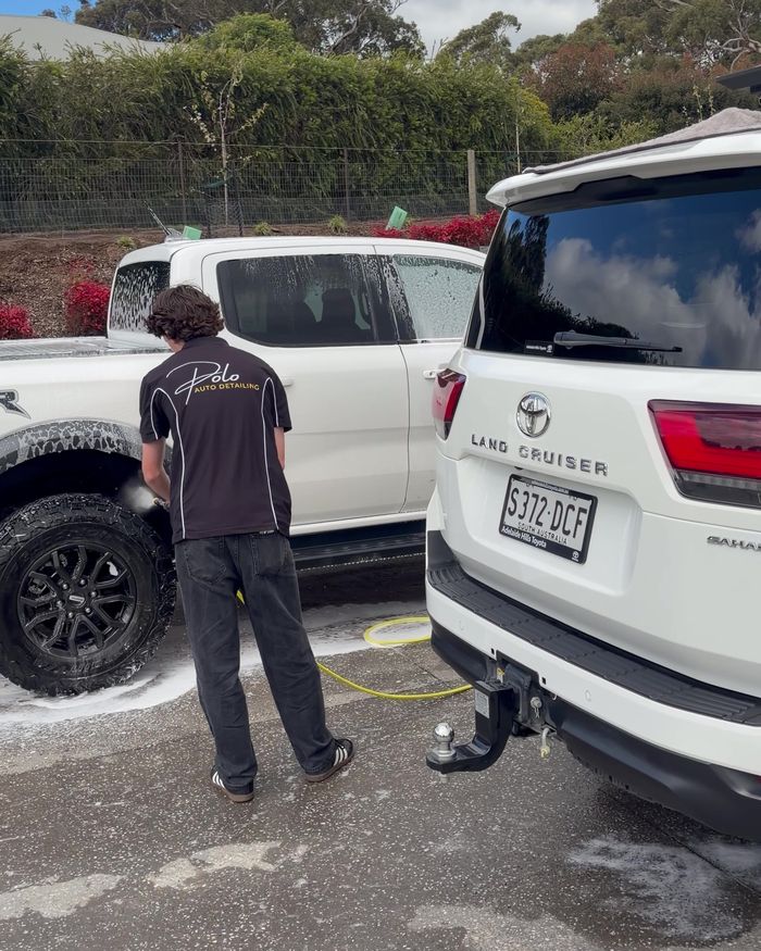 Working on a LandCruiser 300 on the customer's driveway