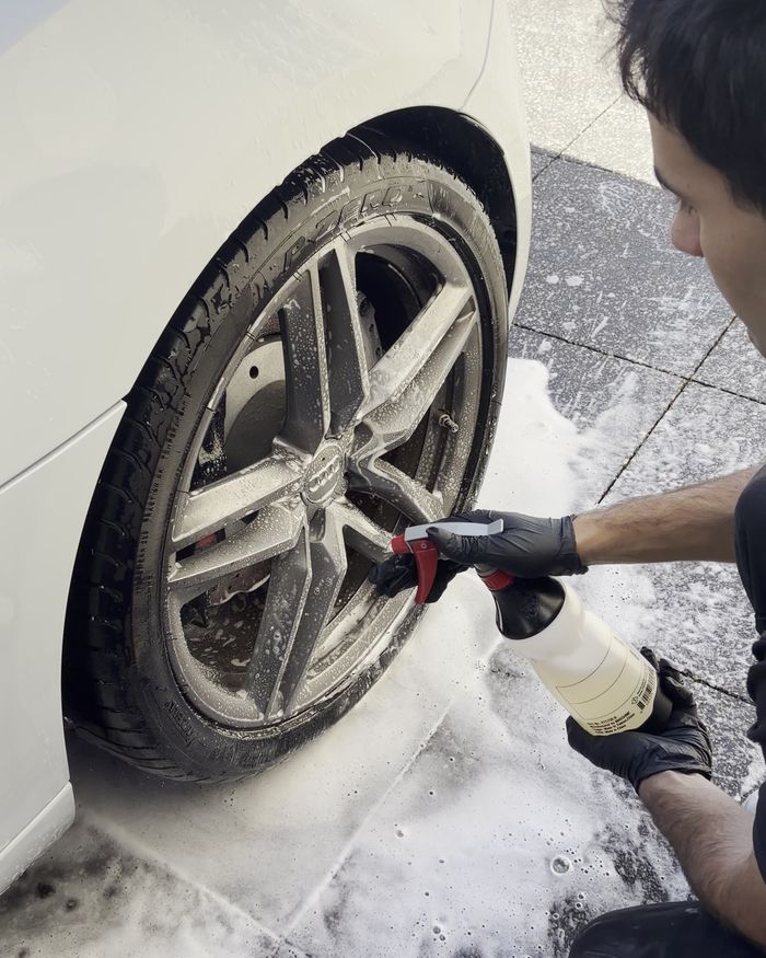 Cleaning the wheels on an Audi R8